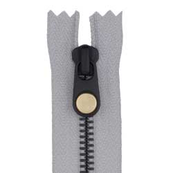 Rivet bottom stop zipper with rivet pull slider